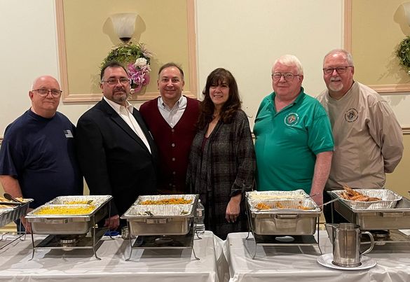 Members of the Knights of Columbus with Food Brigade Executive Director Carmine DeMarco and President Karen DeMarco